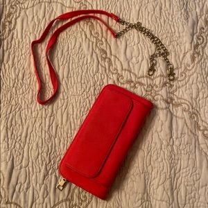 Crossbody purse with phone pocket.